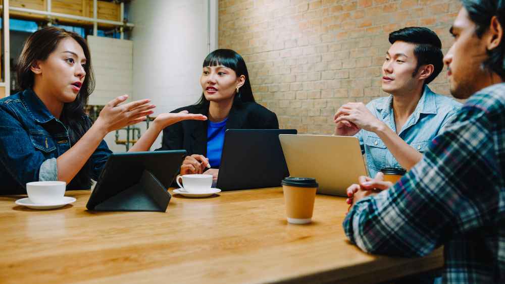 business coworkers using team casual discussion with Experts